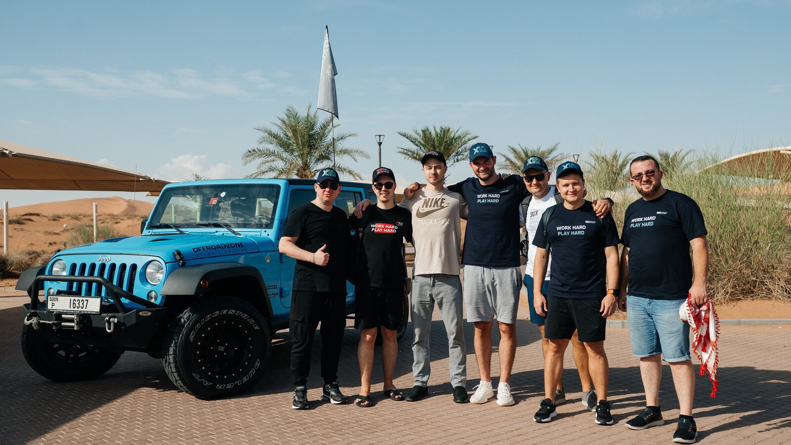 A team finding its way among the dunes with a map and a compass