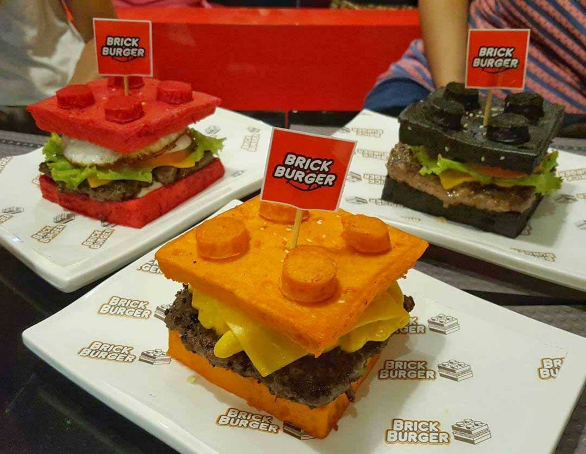 A team building a three-dimensional model out of Lego bricks