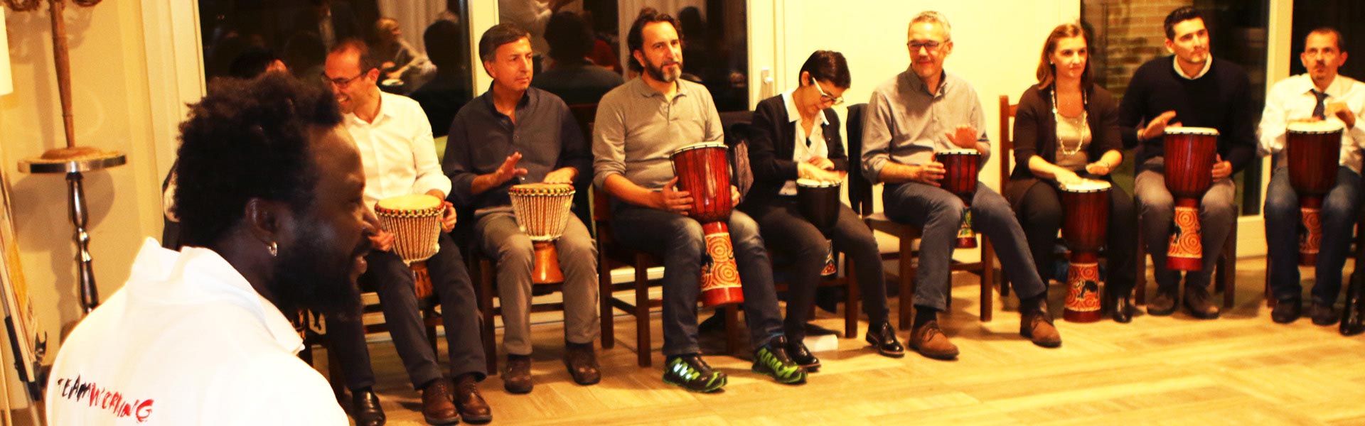 A group making music together during a team building activity