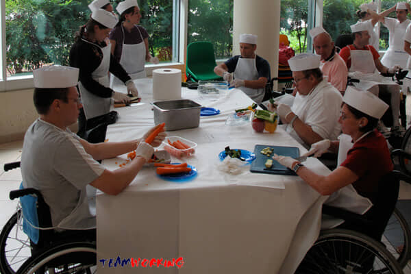 A group cooking together during a team building activity