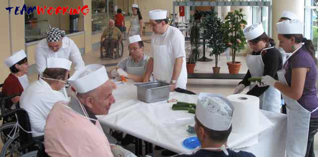 A group cooking together during a team building activity